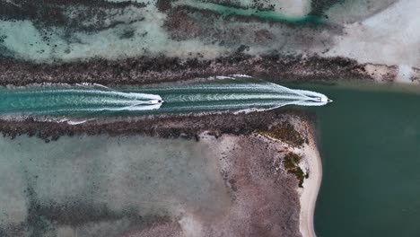 two boat going through a canal