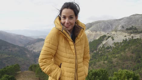 smiling woman appreciating the peace of nature