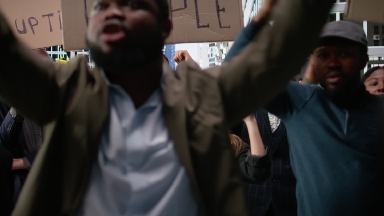 People and activists protesting against corruption during a public march