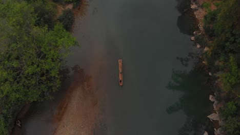 Fisherman-on-bamboo-raft-at-Meo-vac-district-Vietnam,-aerial