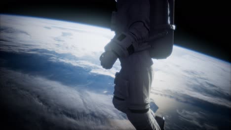 astronaut in outer space against the backdrop of the planet earth