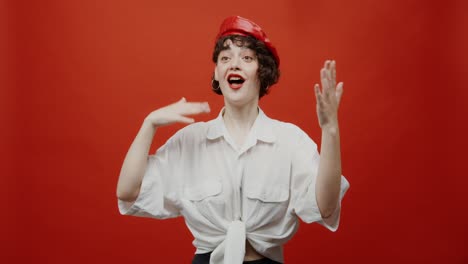 woman in a red beret, excited expression