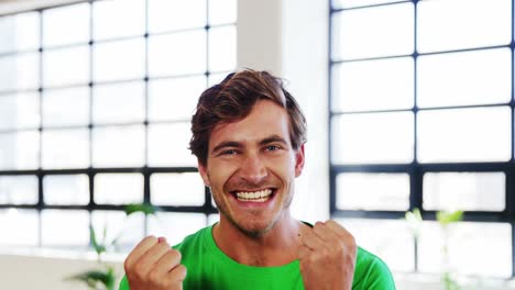 Man-in-recycling-tshirt-showing-thumbs-up-sign