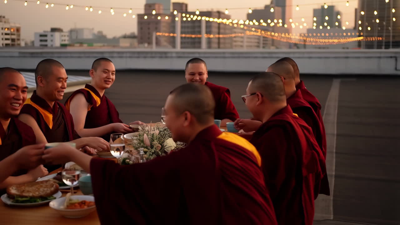 Monks dining on rooftop