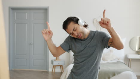 Man Listening to Music and Video Calling