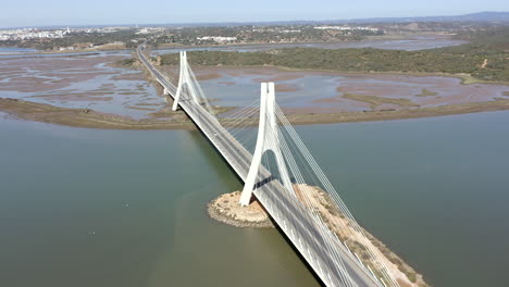 Bridge-Ponte-and-road-traffic-near-Portimao-,-in-the-Faro-District,-Portugal