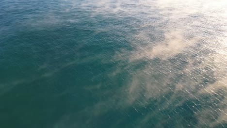 Fog-Moving-Over-The-Open-Blue-Waters-Of-Sea-In-The-Morning