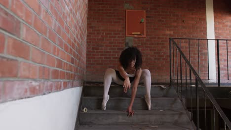 Female-dancer-in-an-empty-warehouse