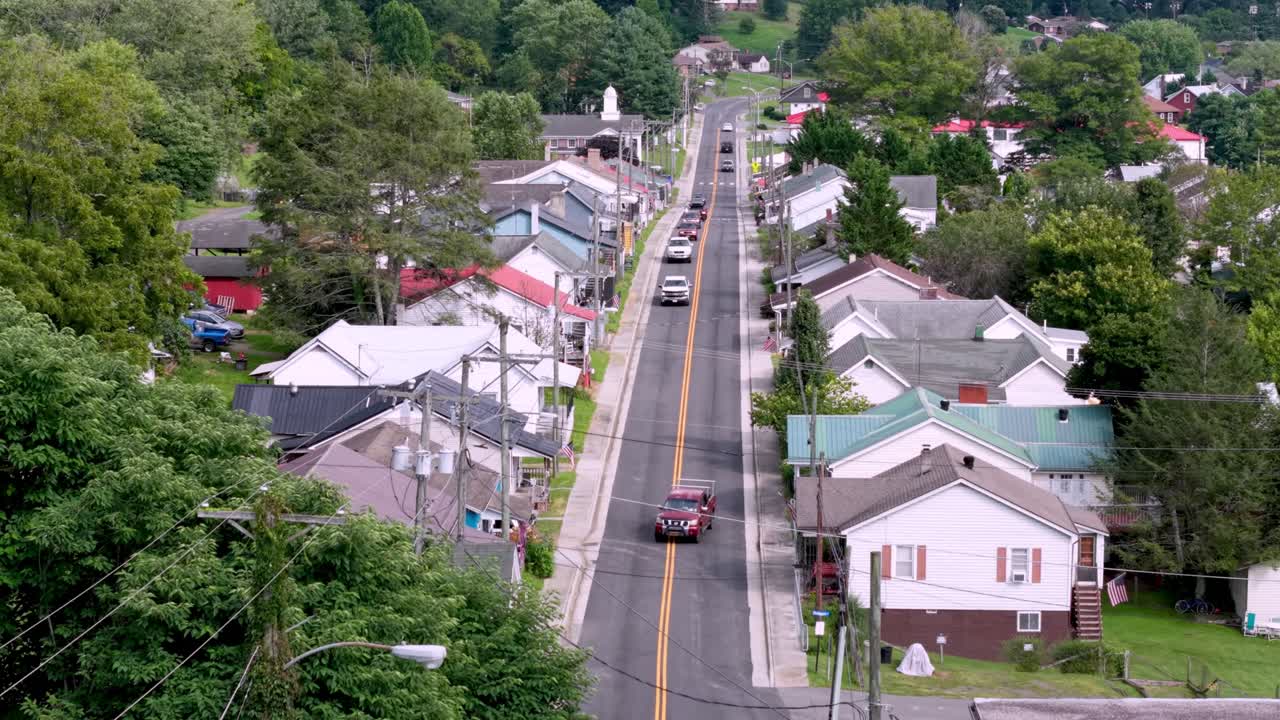 aerial push in to row of mill houses in Fries Virginia