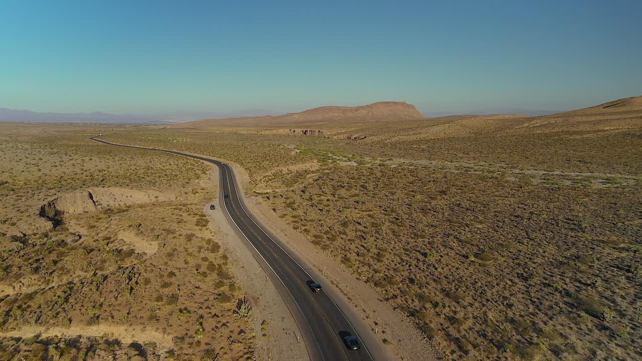 Aerial footage of an isolated road in the desert outside of Las Vegas Nevada