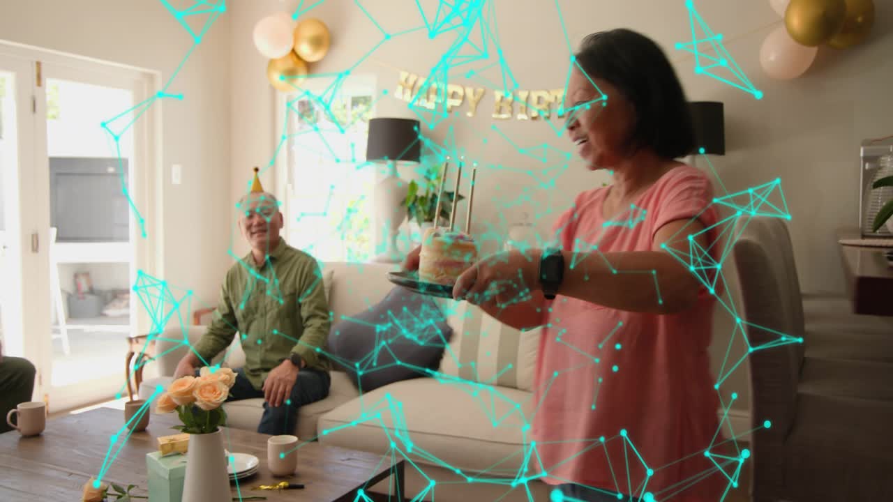 Senior woman lighting candles walking and presenting cake for birthday teal overlay obscuring faces