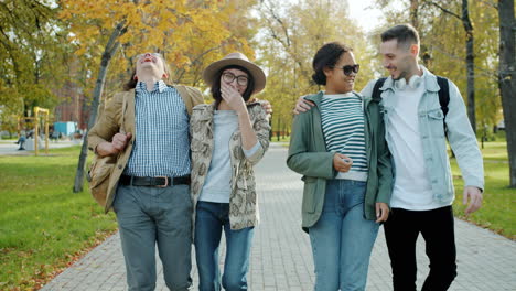 friends enjoying a walk in the park