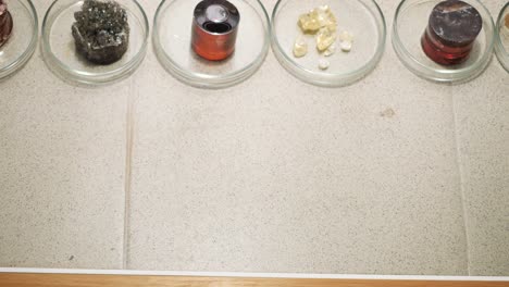 scientist cleaning work area in laboratory