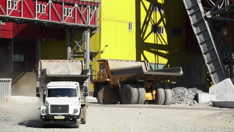 mining trucks at industrial site