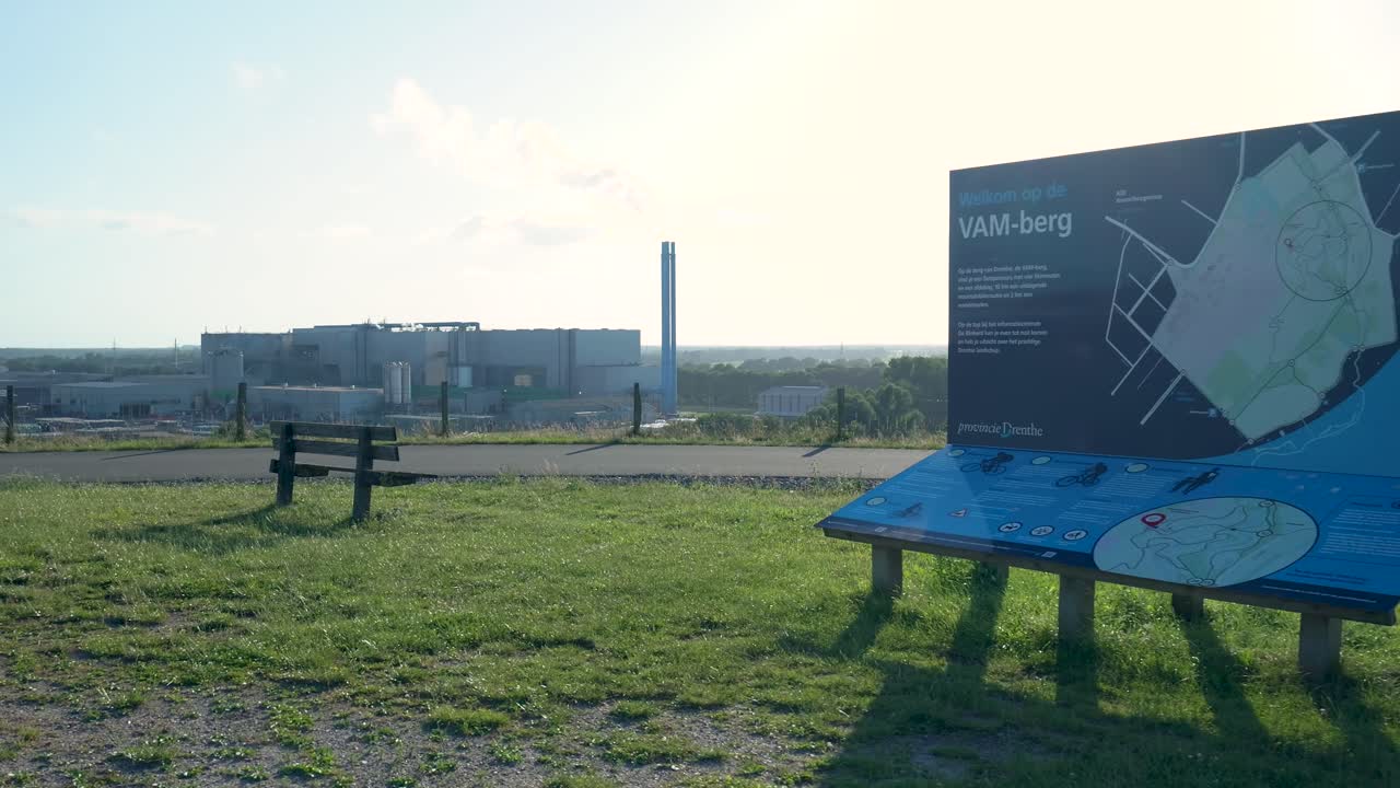 Industrial Plant with Information Board at a Scenic Overlook