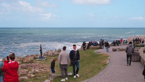 visitors in hermanus doing land based whale watching at gearing's point