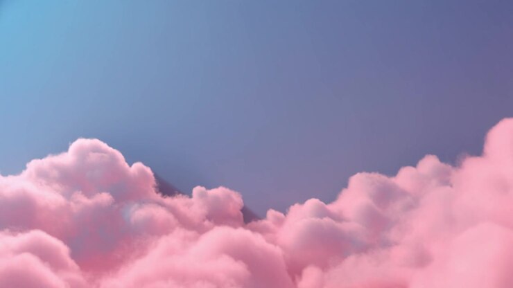 Soft Pink Clouds Floating in a Clear Blue Sky