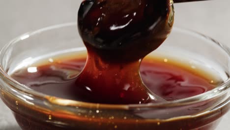 dipping sauce with wooden chopsticks