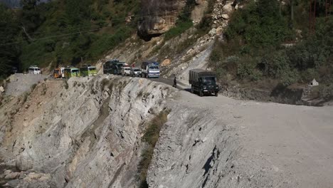 road to the himalayas road traffic at himalayan road, upper himalayas, uttarakhand, india