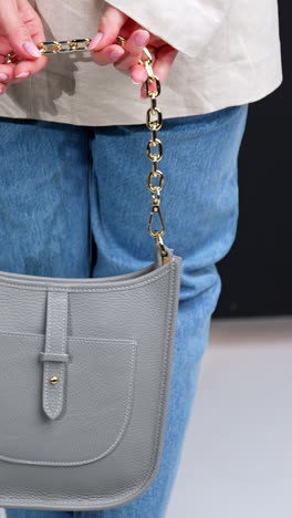 grey leather shoulder bag with gold chain