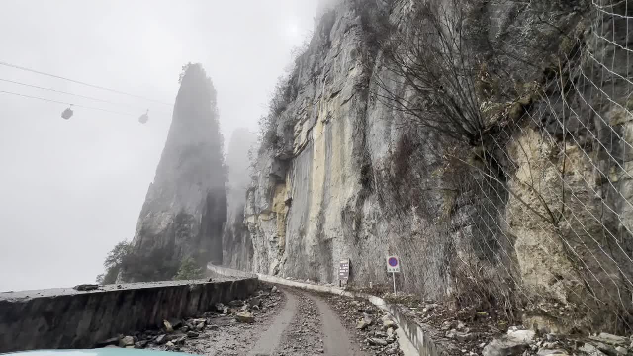 Vehicles driving on steep walled roads