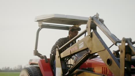 farmer driving a tractor