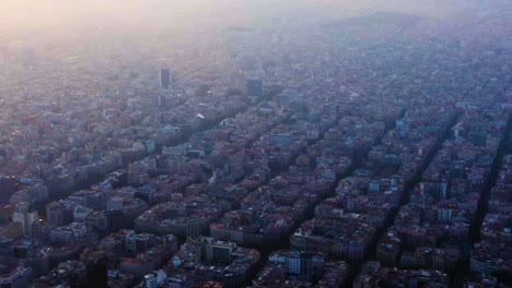barcelona cityscape high angle view, at sunset with clouds, spain