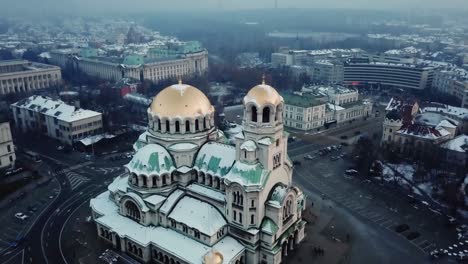 Fly-to-top-of-Aleksandar-Nevski-in-Sofia-on-cloudy-day