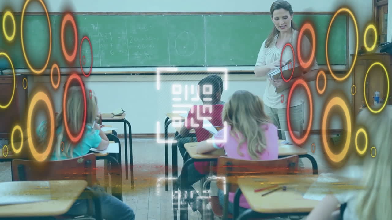 In school, teacher using animation overlay while interacting with students in classroom