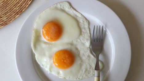 fried eggs on plate