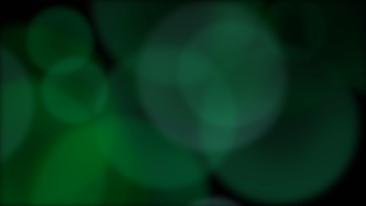 bokeh redondo verde mosca sobre fondo oscuro