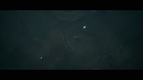 alien planet desert landscape at night with strange sphere-shaped buildings