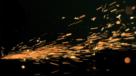 Sparks-flowing-in-super-slow-motion-on-a-surface