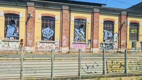 train station with graffiti and train