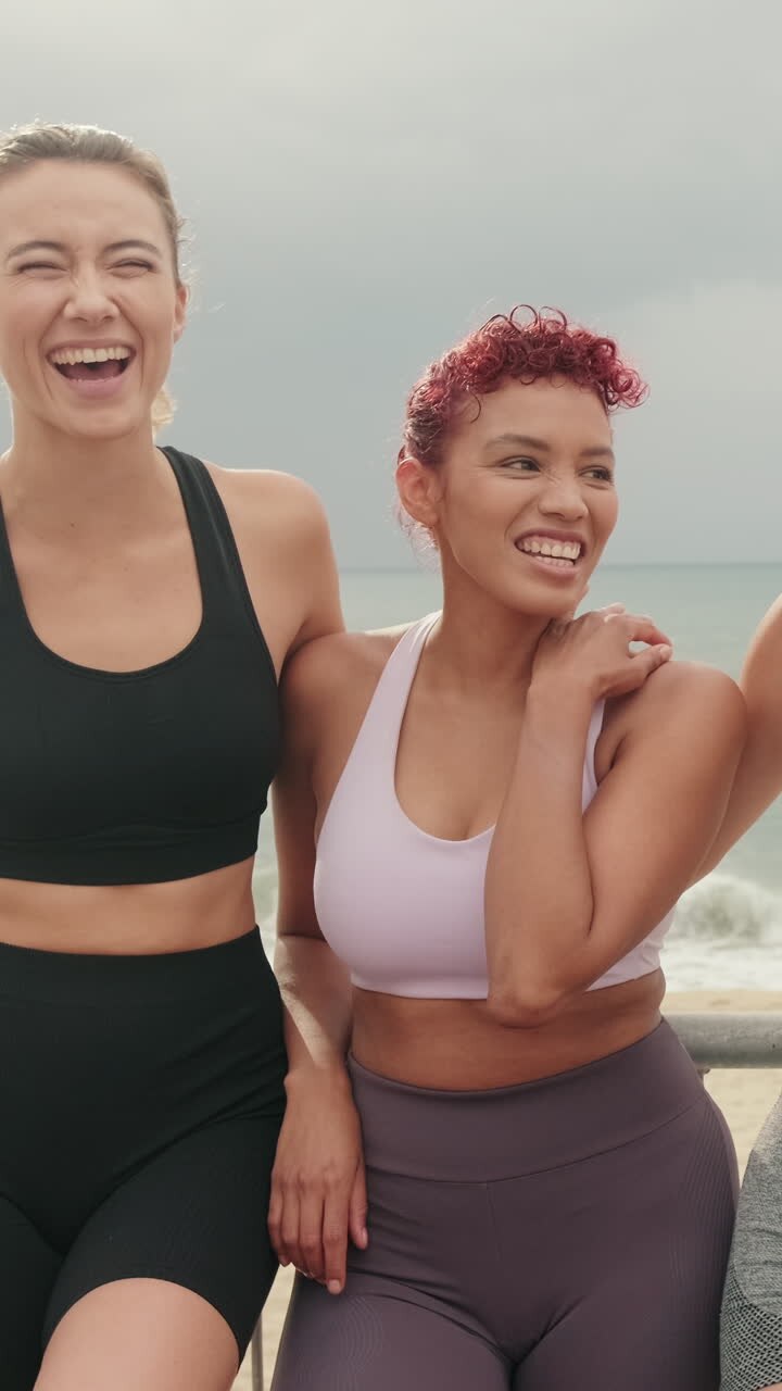 Friends Laughing Together After Beach Workout