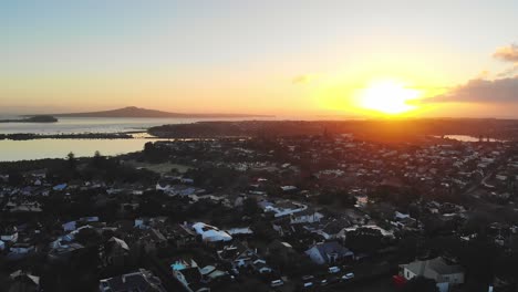 Residential-neighborhood-in-Auckland,-Rangitoto-island-background