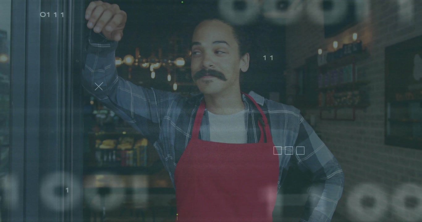 Man leaning on café door frame scanning sidewalk as digital overlays flickering for business data