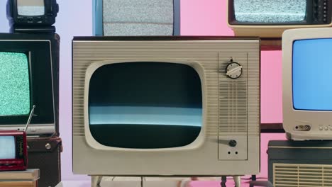 collection of vintage television sets