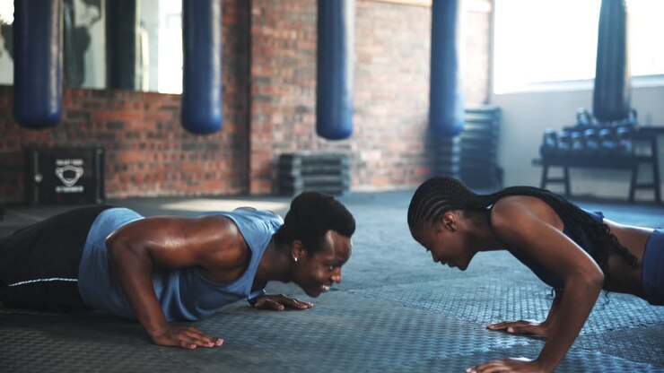 Pushups, support and a black couple with fitness