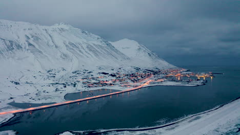 breathtaking winter landscape of siglufjörður town in north iceland - aerial shot