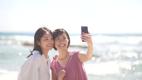 woman taking pictures with a smartphone