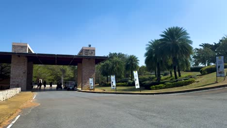 approaching the golf club entrance in thailand