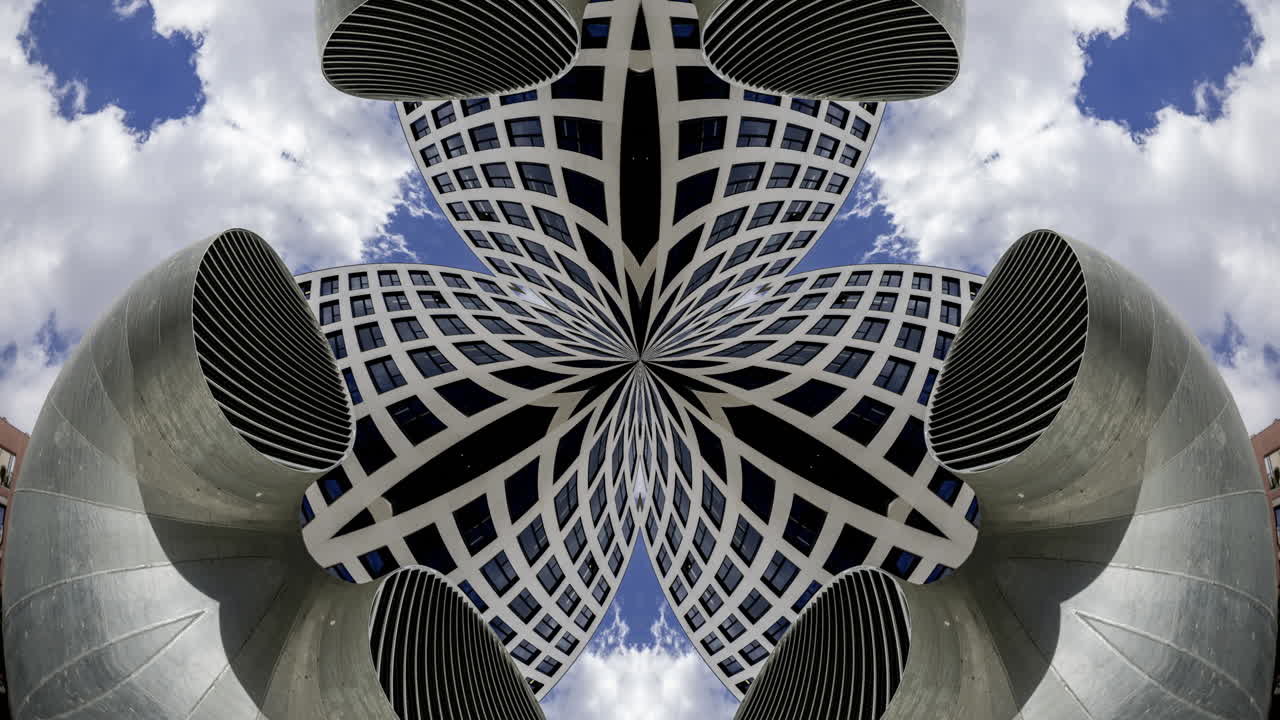 Old factory and industrial complex with passing clouds made into abstract pattern