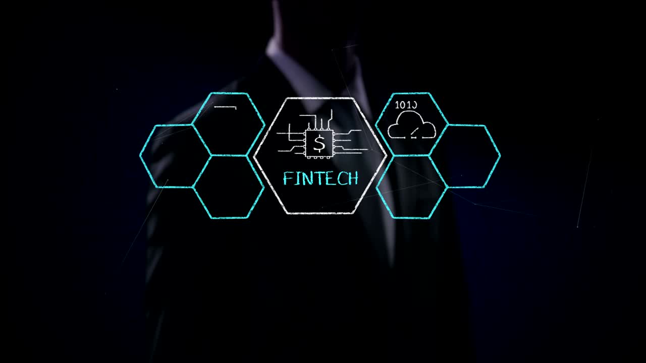 empresario tocando el icono de la tecnología financiera y varios gráficos. tecnología financiera futurista. película 4k. versión 1.