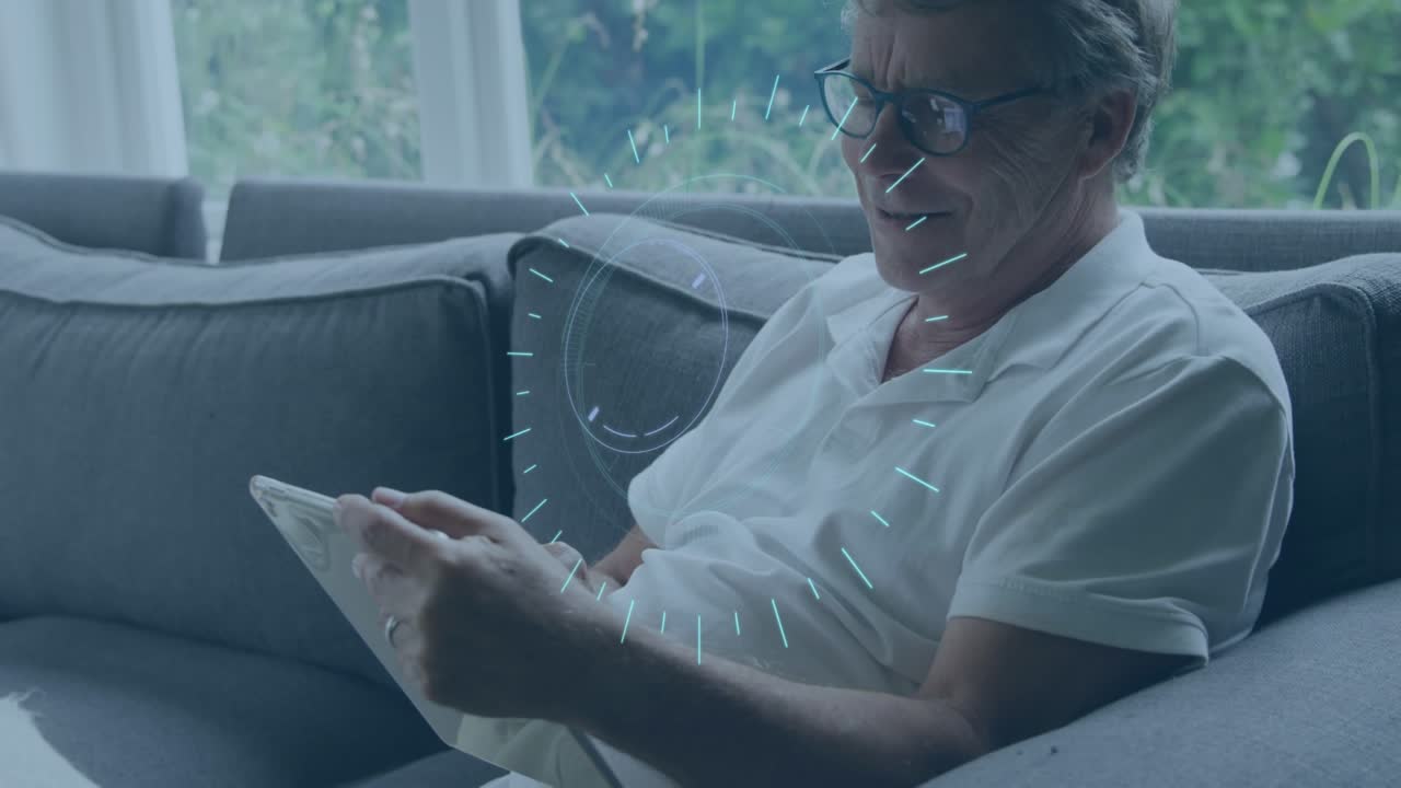 Animation of clock moving over caucasian senior man using tablet