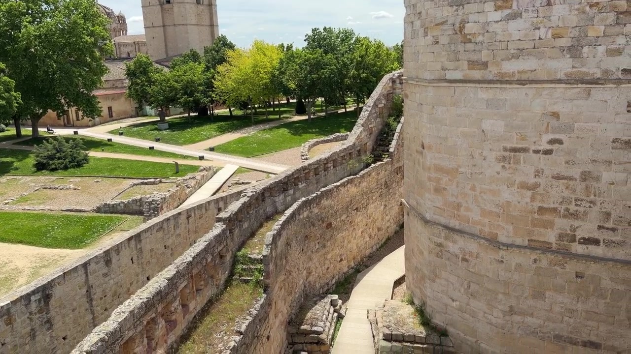 Panoramic view of a stone castle courtyard