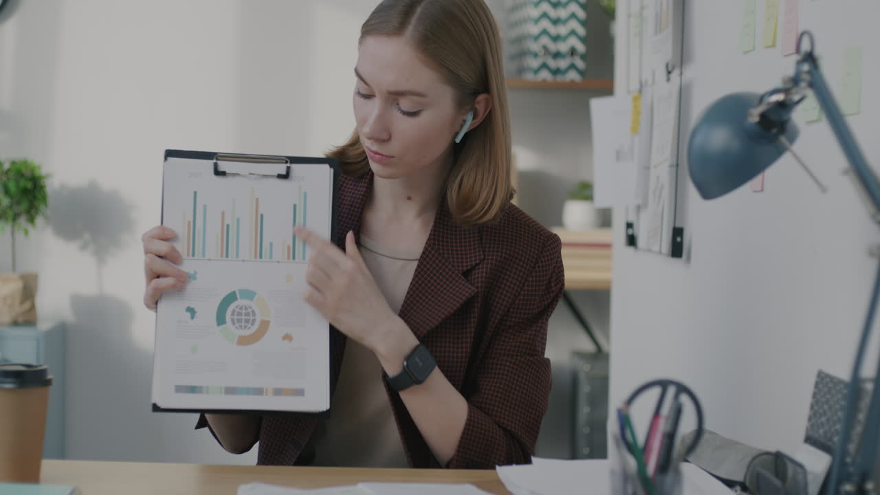Business Woman Presenting Data in Video Conference