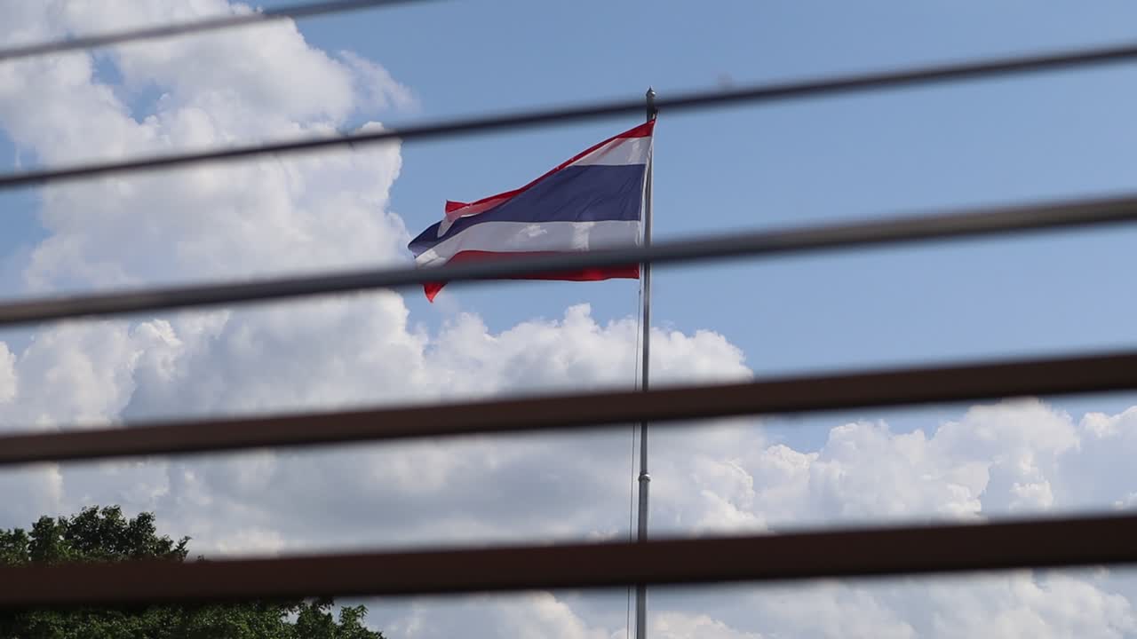 Watch Thailand flag thru a curtain.