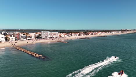 Aerial:-Palavas-les-Flots-with-Jet-Skis-on-Water,-during-Feria-Festival