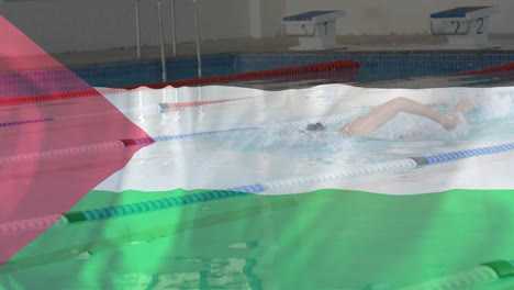 animation of flag of palestine over caucasian female swimmer in swimming pool